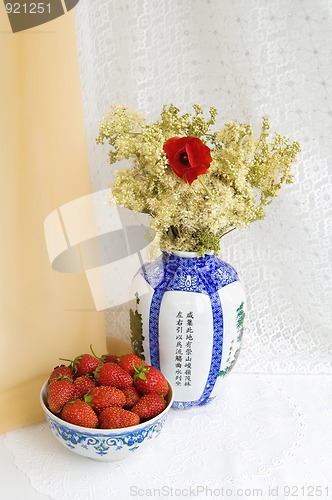Image of Still life with strawberries and flowers