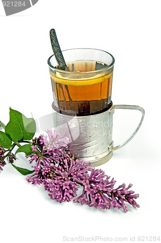 Image of Tea in a glass with lilac