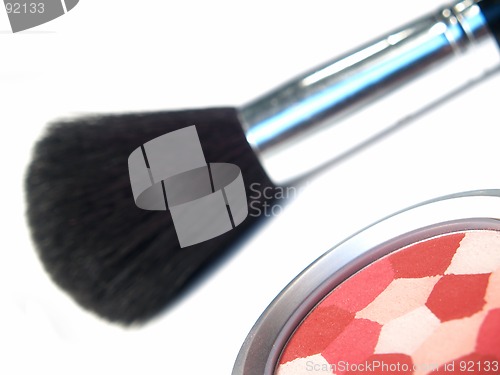 Image of cosmetics and brush