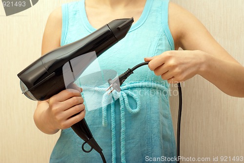 Image of Black hairdryer