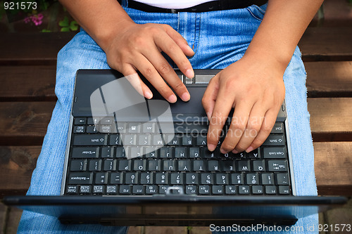 Image of man using laptop