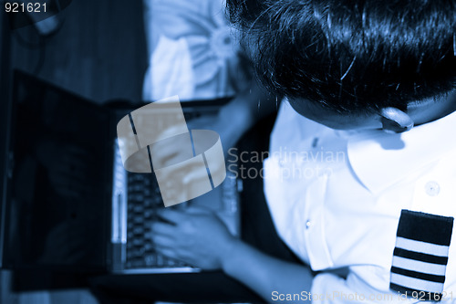 Image of man using laptop