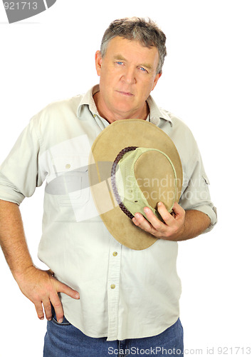 Image of Man Holding Hat
