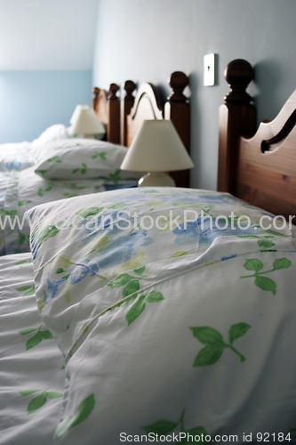 Image of Three single beds in a row