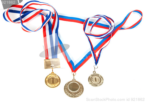 Image of Three medals for first place with tape