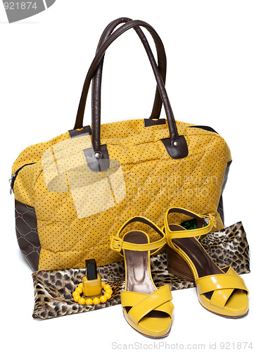 Image of Feminine bag and pair yellow feminine loafers