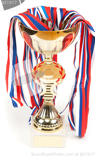 Image of Golden cup, medals with tape