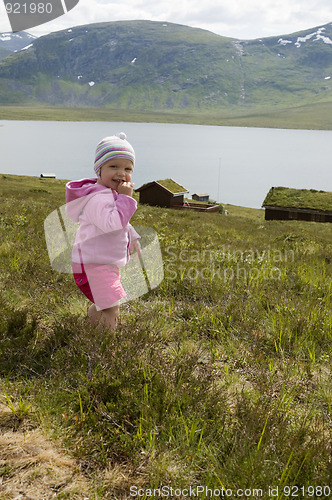 Image of Toddler in alpine landscape