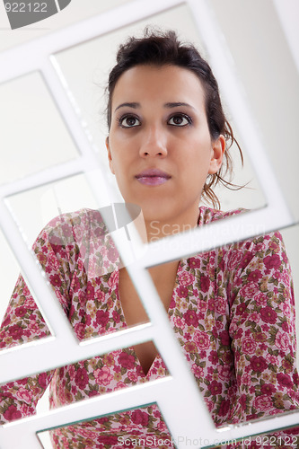 Image of woman on mirror, broken