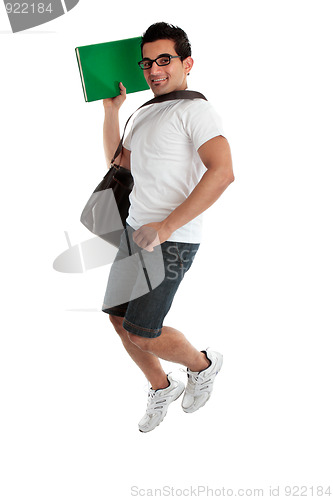 Image of Jumping student holding book