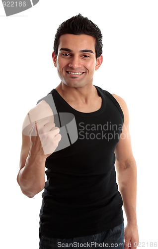 Image of Smiling man success fist