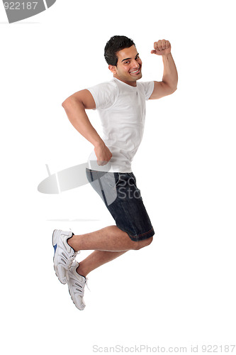 Image of Thrilled man jumping for joy