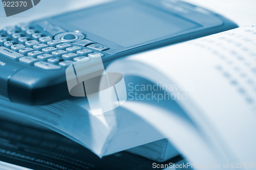 Image of book and cellphone