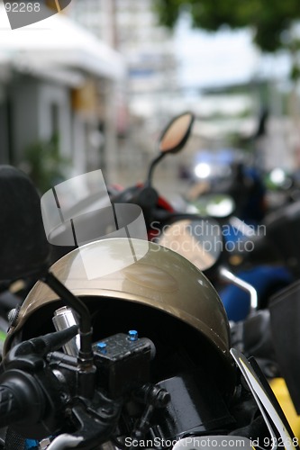 Image of Motorcycle helmet placed on motorbike