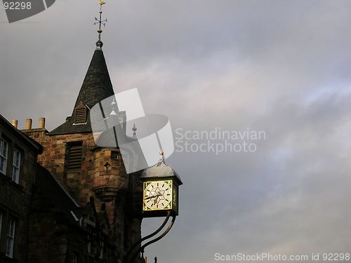 Image of Clock tower in a cloudy sky