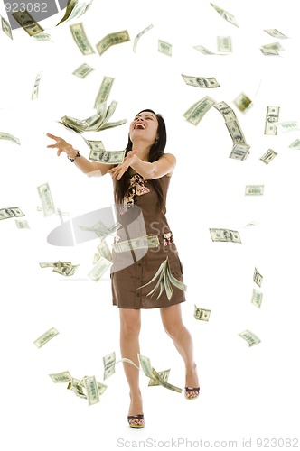Image of pretty woman throwing money