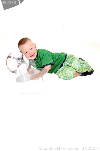 Image of Little boy with football.