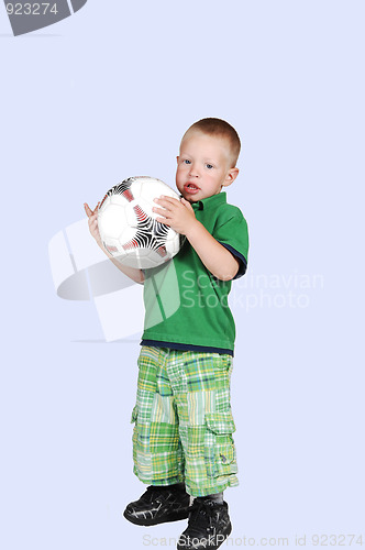 Image of Little boy with football.