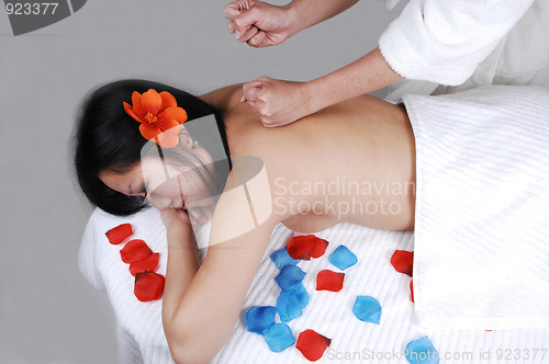 Image of Chinese girl getting massage.