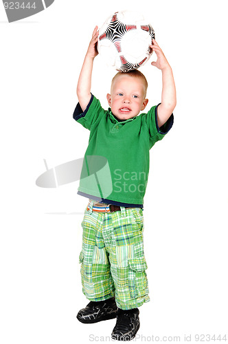 Image of Little boy with football.