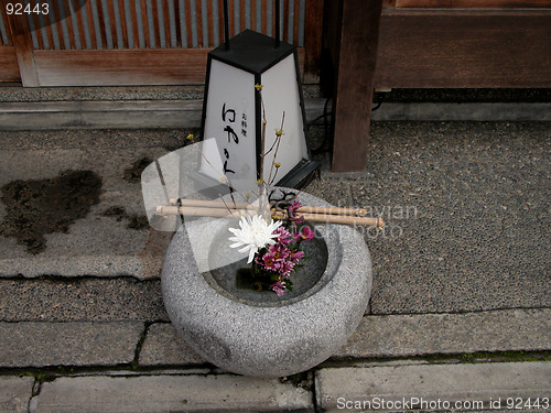 Image of Lantern and flowers