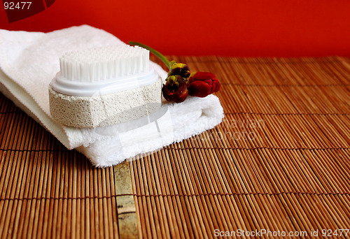 Image of Pumice brush and towel at a spa - copy space