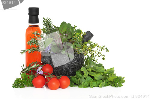 Image of Chili Oil, Herb Leaves and Tomatoes