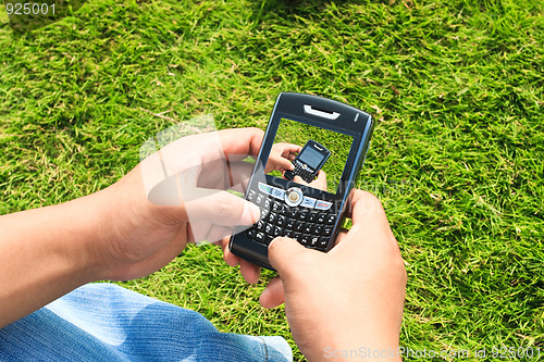 Image of man using cellphone