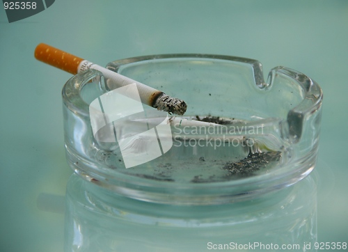 Image of Cigarette and ash tray