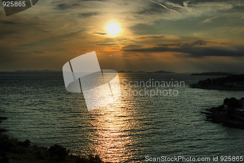 Image of Dramatic sunset with beautiful clouds 