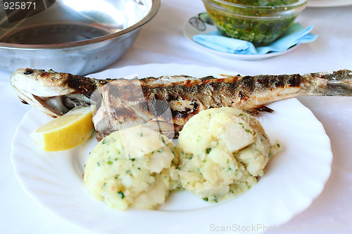 Image of Roasted fish with potatoes 