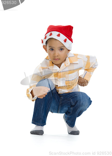 Image of boy with santa claus hat