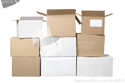 Image of Brown and white different cardboard boxes arranged in stack