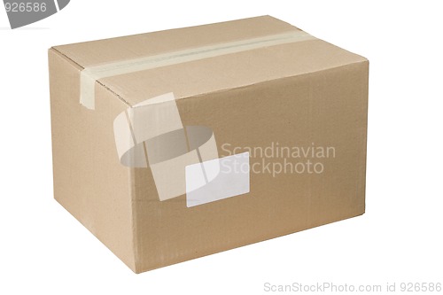 Image of closed shipping cardboard box whit white empty label