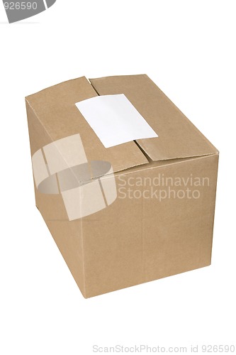 Image of closed shipping cardboard box whit white empty label