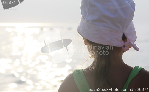 Image of Girl looks at the sea