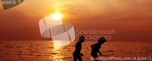 Image of Children, sea and sunset