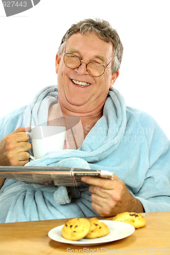 Image of Middle Aged Man At Breakfast