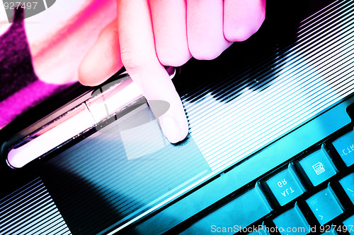Image of Working at laptop .