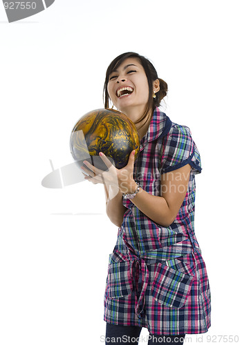 Image of pretty woman with bowling ball