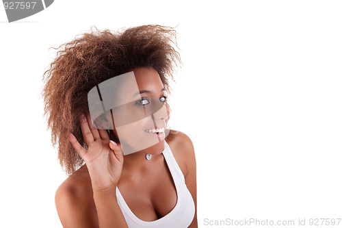 Image of black woman, listening, viewing the  gesture of hand behind the ear