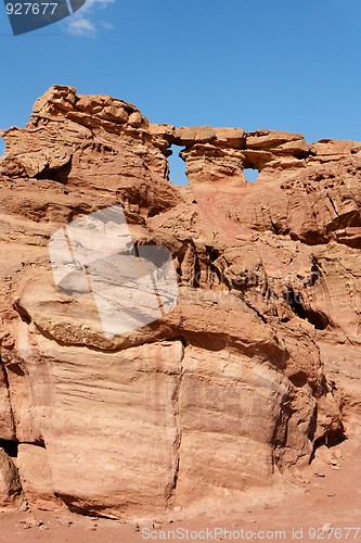 Image of Scenic weathered orange rock in stone desert