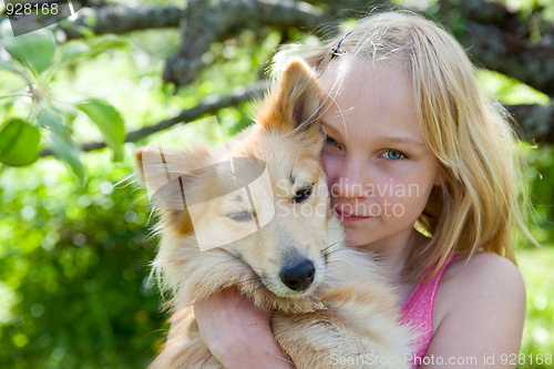 Image of Girl with pet dog