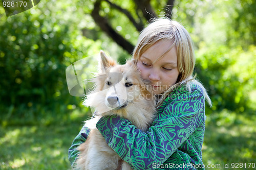 Image of Girl with pet dog