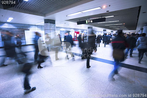 Image of rushing people