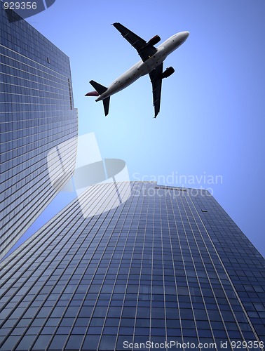 Image of airplane and the modern building