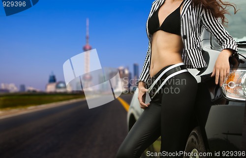 Image of car and girl