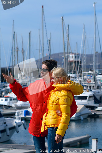 Image of young man and woman in the port 