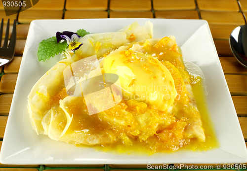 Image of Orange Crepes With Ice Cream