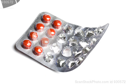 Image of red pills isolated on white 